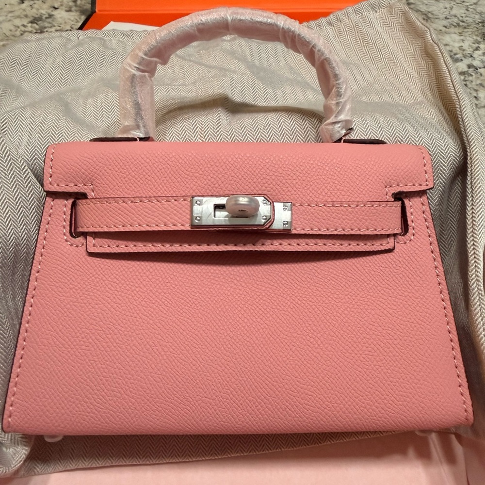Pink mini Kelly style purse. Amazing!